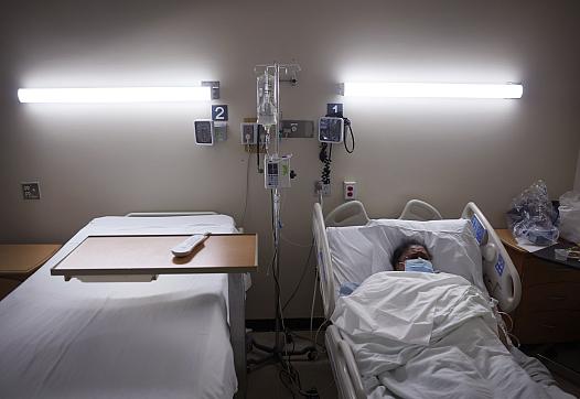 Getty Images: Patient lying in hospital bed.