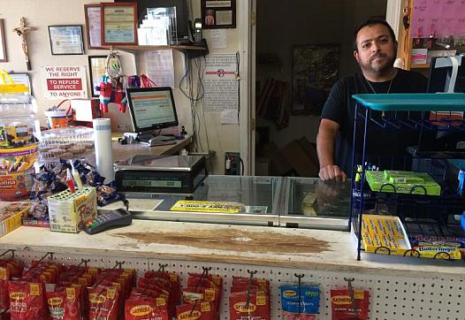Ernesto Carrillo owns Carrillo's Mexican Store in Redding. He's one of the few people in Shasta County translating information.