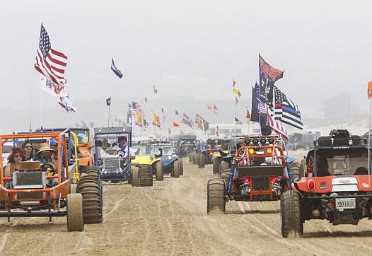 Hundreds of dune buggies paraded along the Oceano Dunes State Recreational Vehicle Area in 2018. David Middlecamp