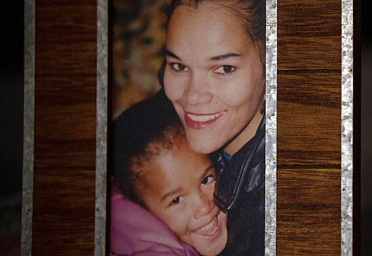 Martina Faulk, and her daughter, Nadia King, embrace in a photograph