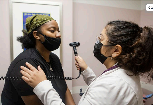 Lashika Steele(Left), a primary care patient, is seen at Mercy Care clinic by Claudina Rubio(right), a nurse practitioner, on Th