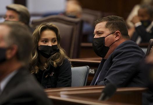 State Sen. Jeff Brandes, R-St. Petersburg, and his daughter listen to opening remarks on the first day of the 2021 legislative s