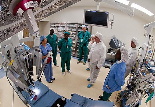 Hospital surgical room with hospital staff.